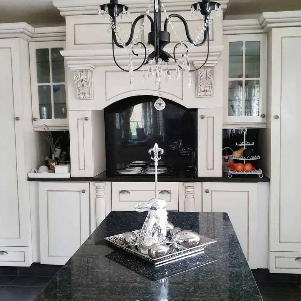 elegant rustic kitchen white cabinets with glass dorrs chandelier