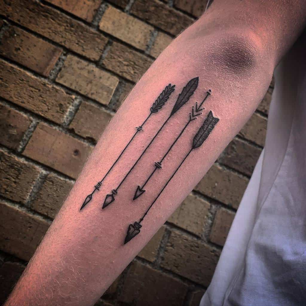 Outer Forearm Arrow Tattoos tommyleetattooer
