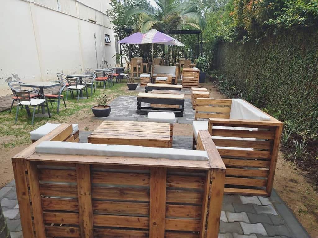 large backyard pallet furniture umbrella palm tree