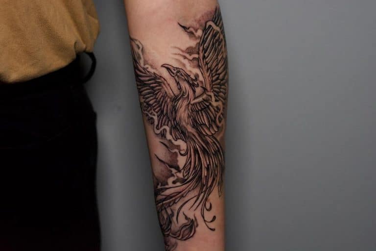 8. "Phoenix rising" tattoo symbolism - wide 7