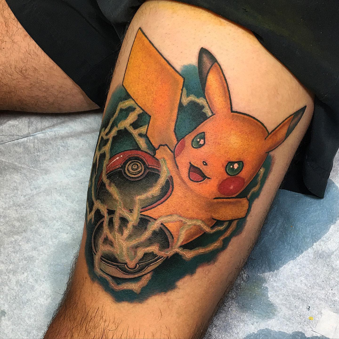 Pokeball Pikachu Tattoo -laserducktattoo