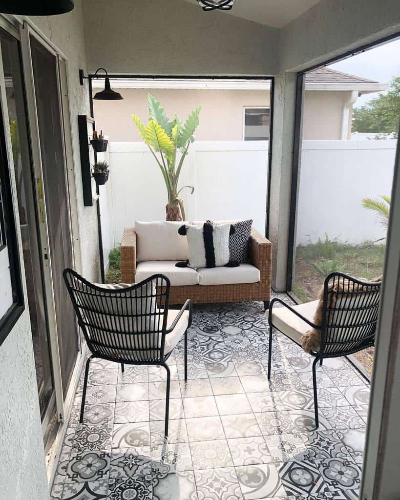 small modern backyard patio wicker sofa tile flooring