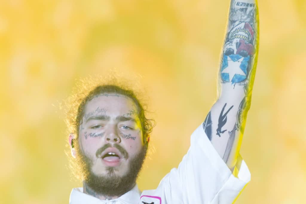 Post Malone In Concert Left Arm Up