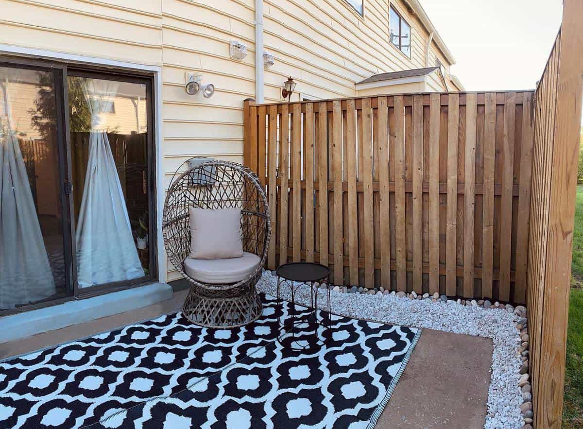 corner patio with wood privacy fence