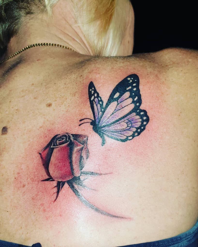 Purple Butterfly Back Tattoo clock_work_tattoo