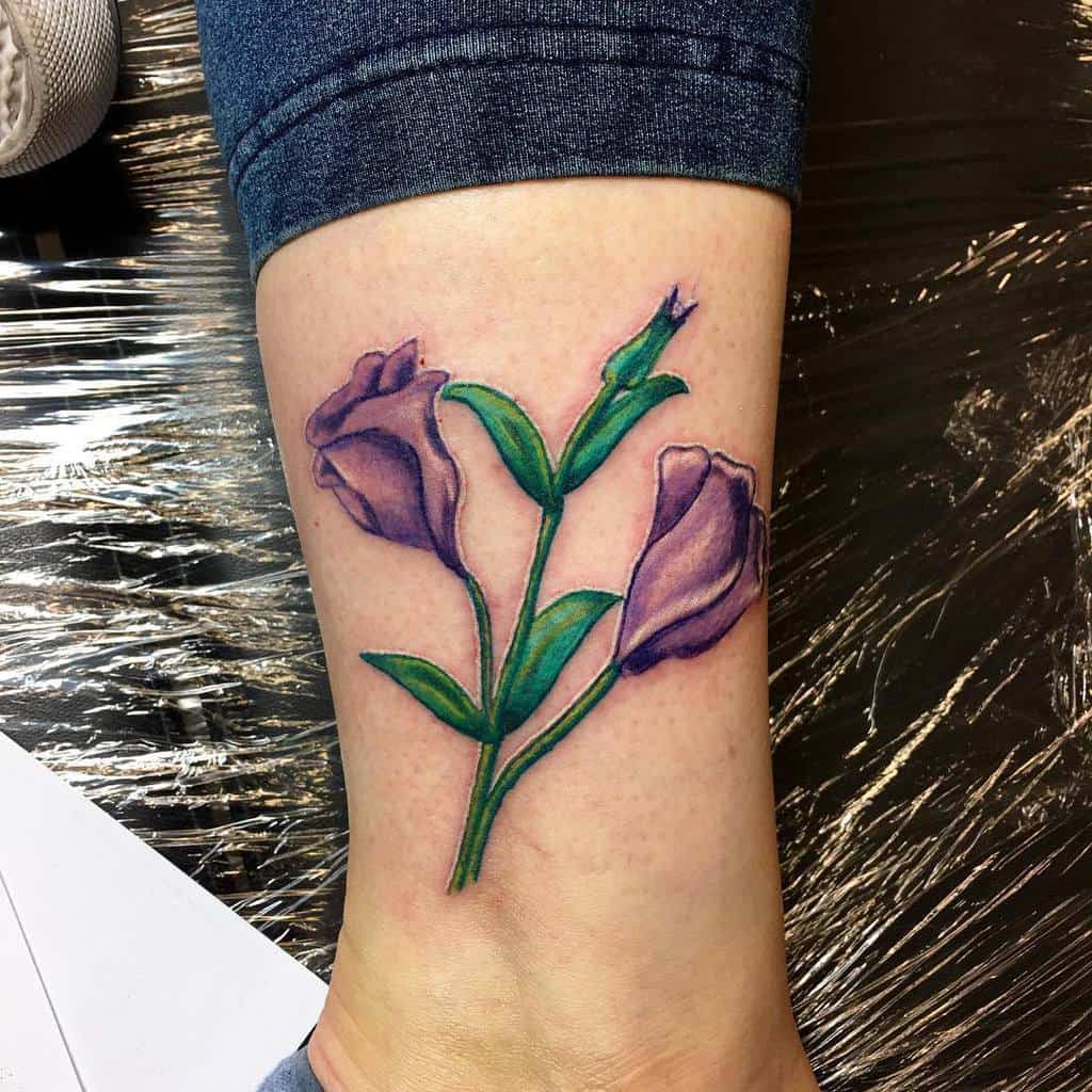 Purple Flower Ankle Tattoo daves_tattoo