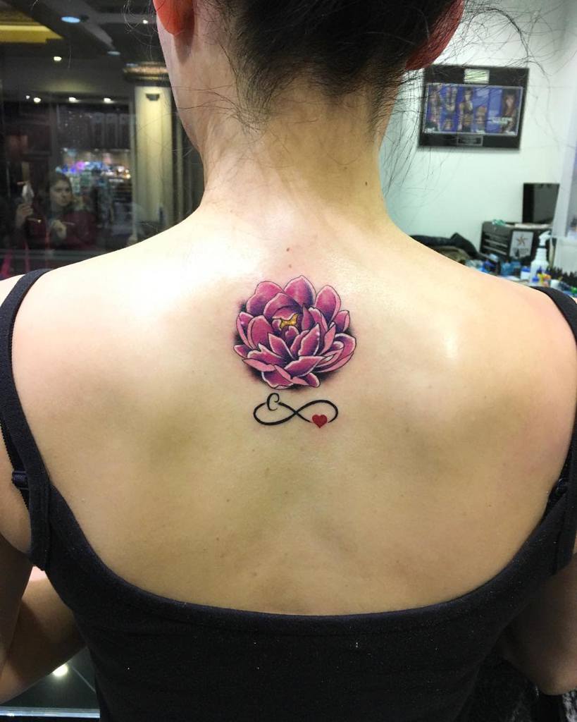 Purple Flower Back Tattoo tattoosbyorion