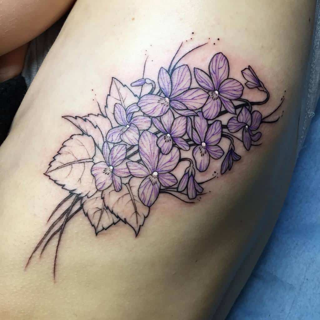 Purple Flower Rib Tattoo maroobacktattoo