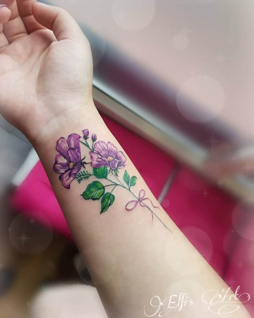 Purple Flower Wrist Tattoo elfivonfriedrich_tattoo
