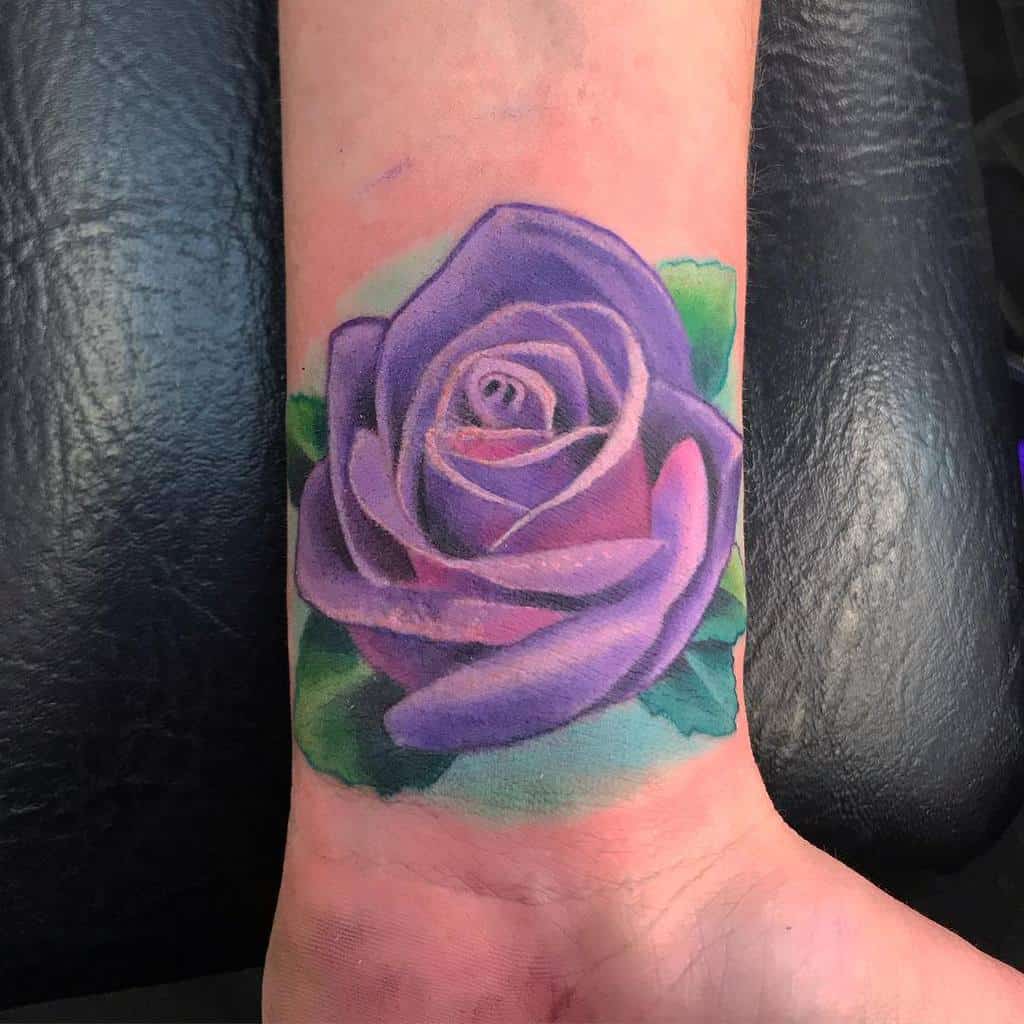 Purple Flower Wrist Tattoo tattoosbyabe
