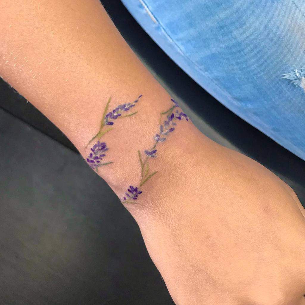 Purple Flower Wrist Tattoo turnertatz