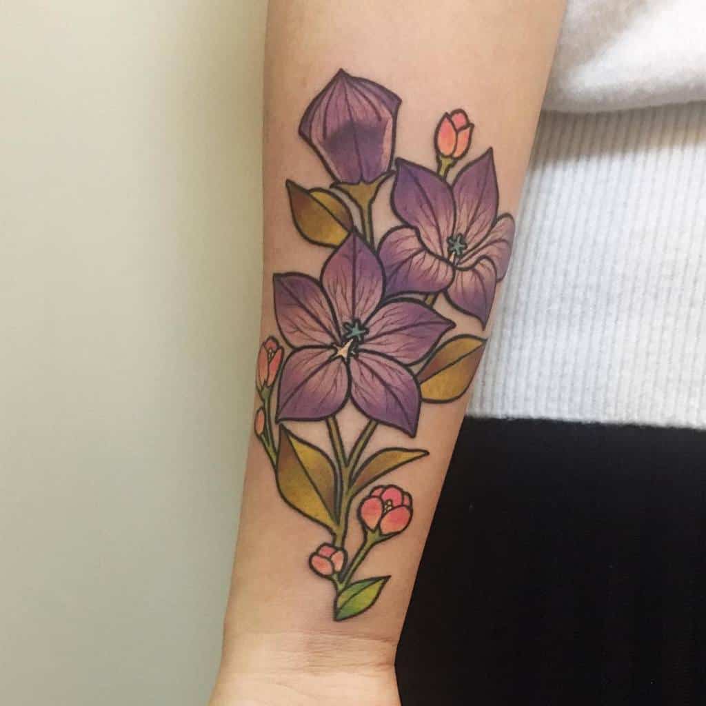 Purple Flower Wrist Tattoo yixuantattoo