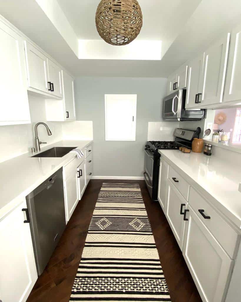 gallery modern kitchen white cabinets black handles quartz countertops 