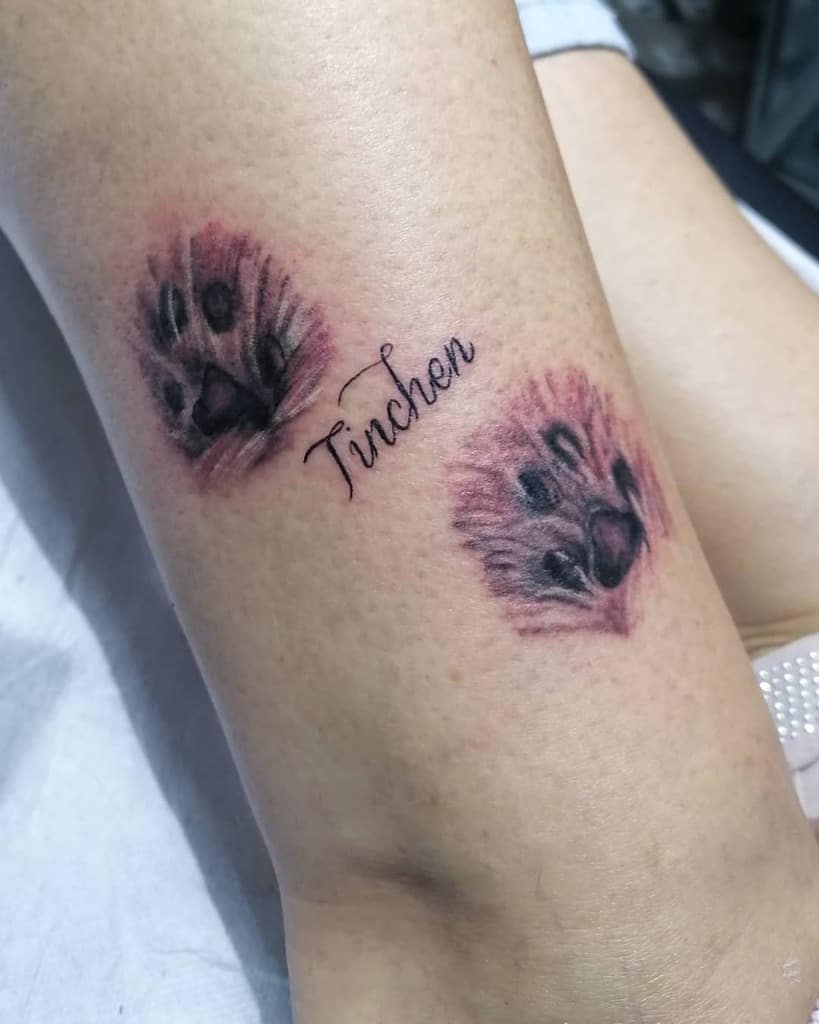 Realistic Cat Paw Print Tattoo datura.tattoo