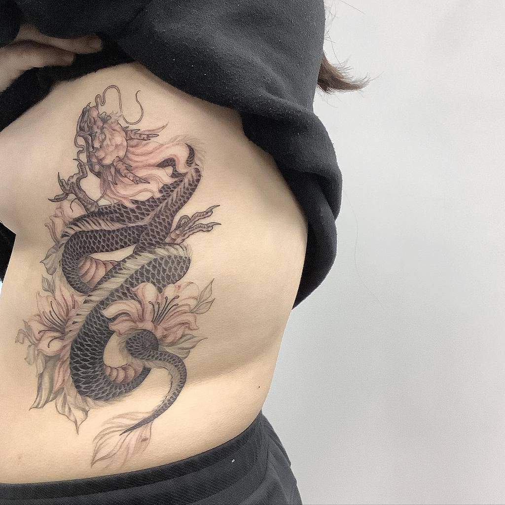 Rib Dragon Tattoos for Women terran.tattooart_css