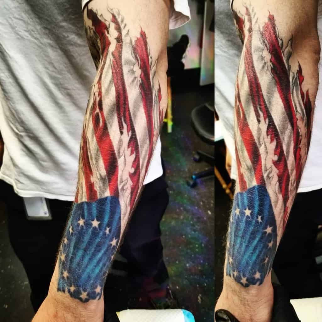 Ripped American Flag Sleeve Tattoo jazzy_tattoos