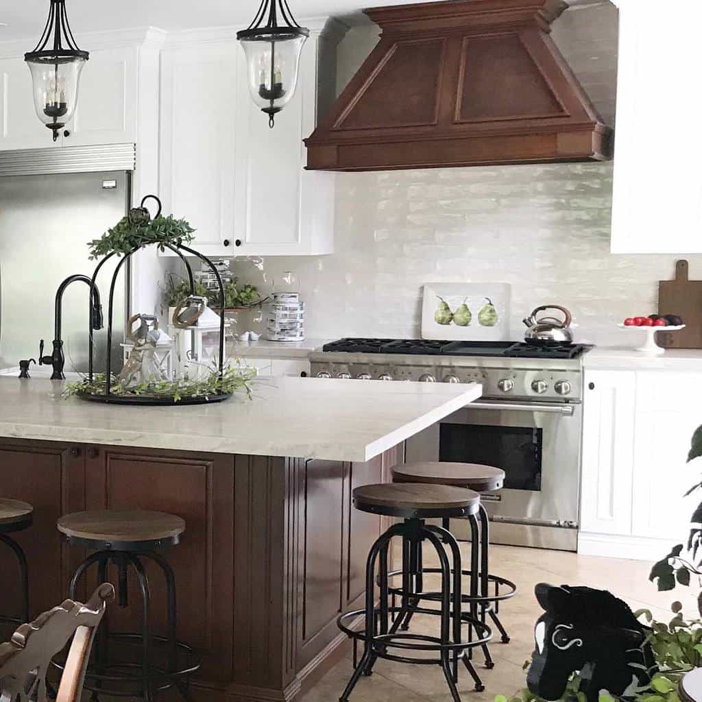 rustic kitchen white cabinets brown island with marble countertop wood stools 