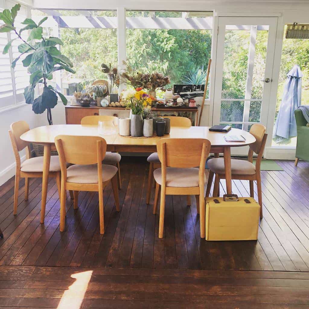 small sunroom with wooden floors