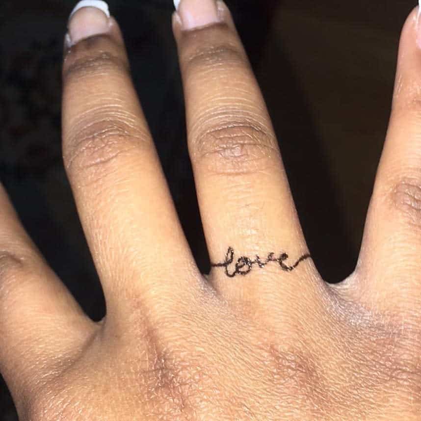 Script And Lettering Ring Tattoo Nevetha.tattoos
