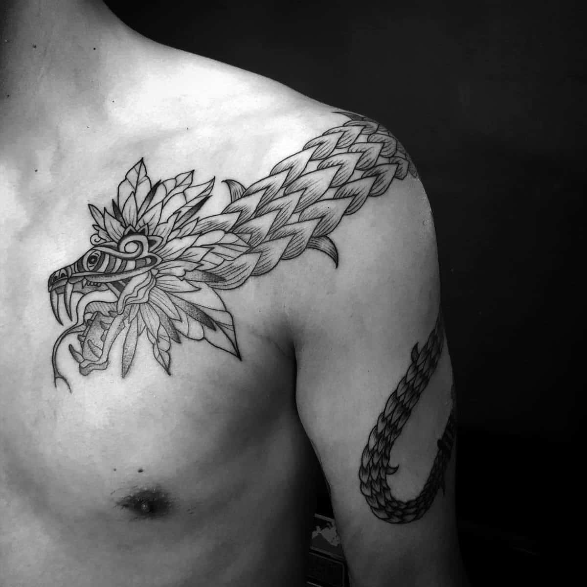 quetzalcoatl shoulder tattoo