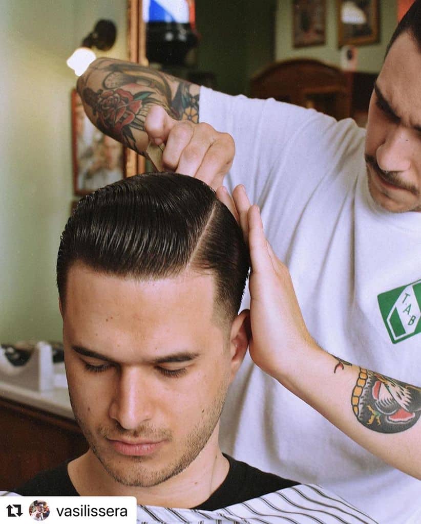 A classic crew cut style with a side-part