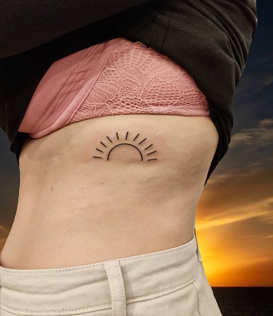 Simple Sun Rib Tattoo krople_tuszu