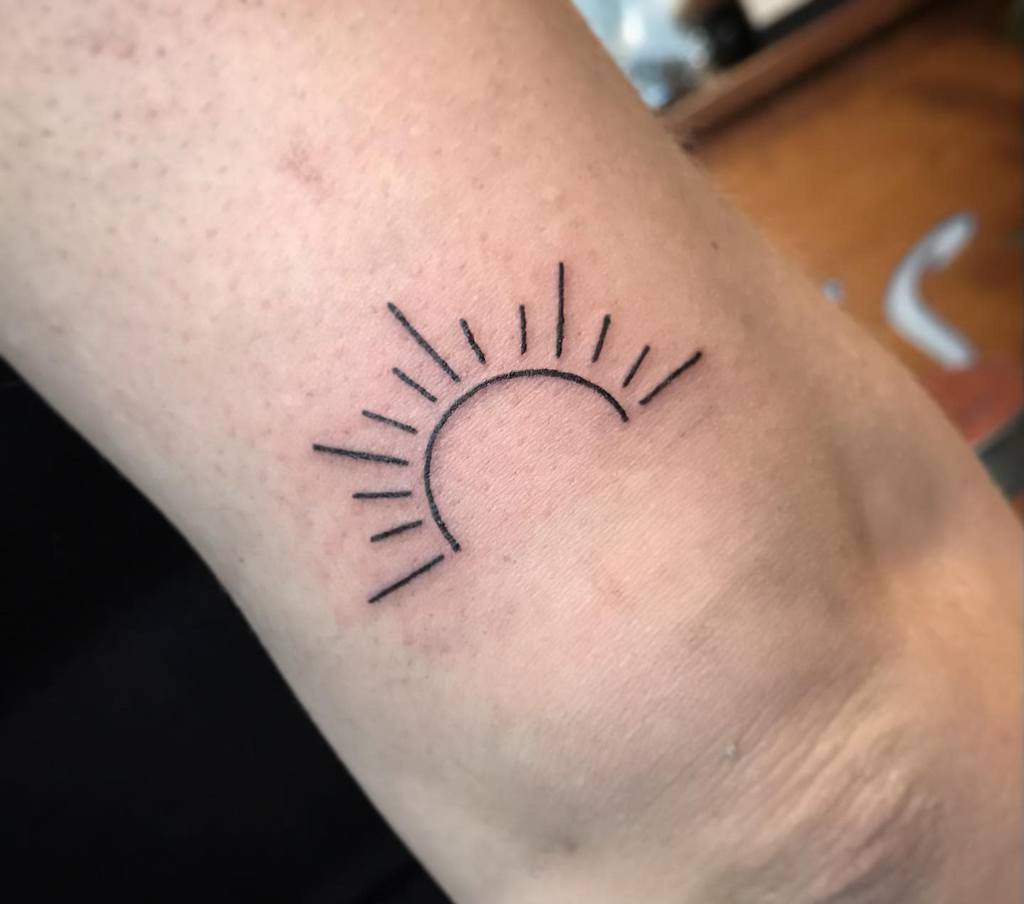 Simple Sun Upperarm Tattoo river.ink_