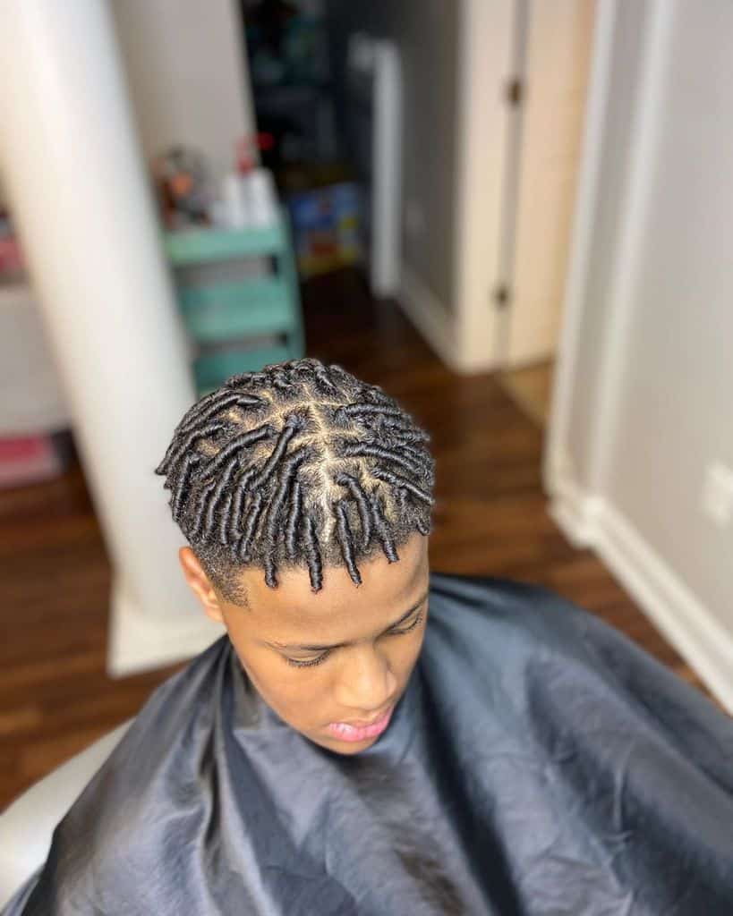 Simple Braided Twists For Men Paired With Shaved Sides And Back