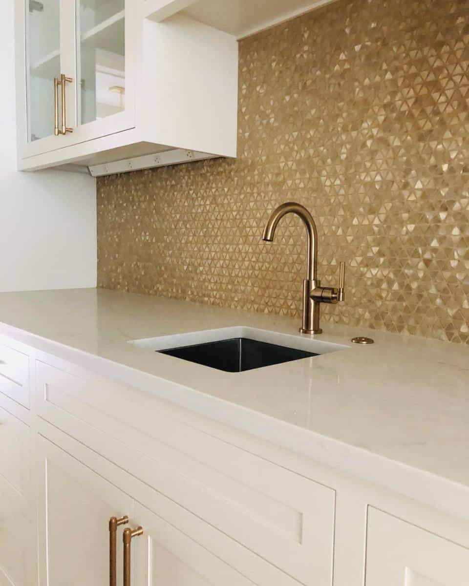 modern kitchen gold tile splashback 