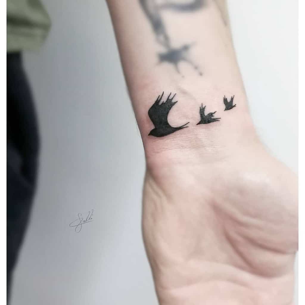 Small Bird Hand Wrist Tattoos Calli Tattoo