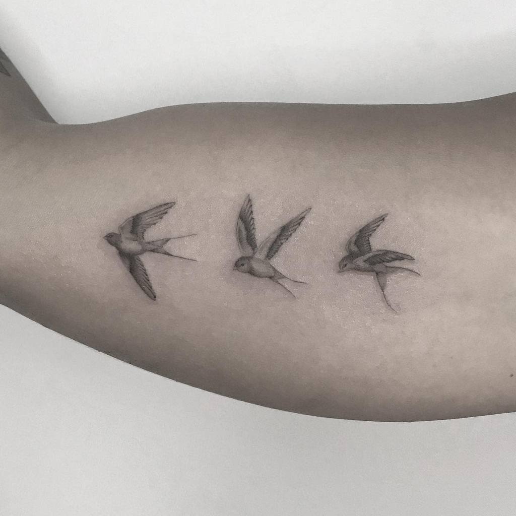 Small Bird Upperarm Tattoos Erikdamasco