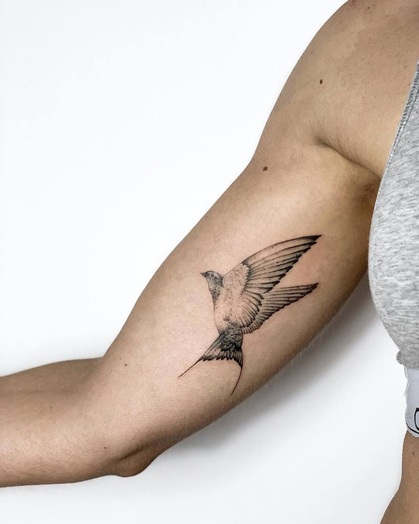 Small Bird Upperarm Tattoos Masnuelo.tattoo