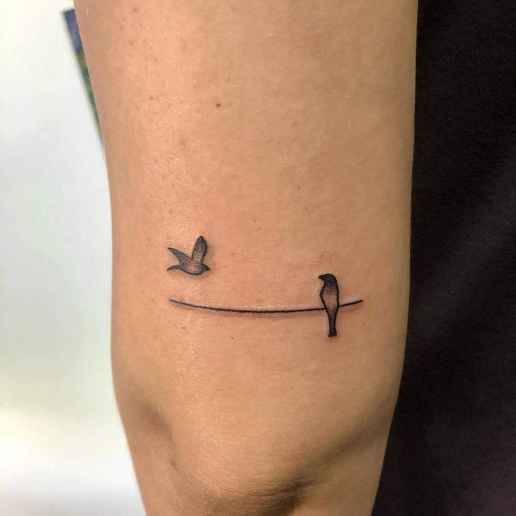 Small Bird Upperarm Tattoos Tattoomer
