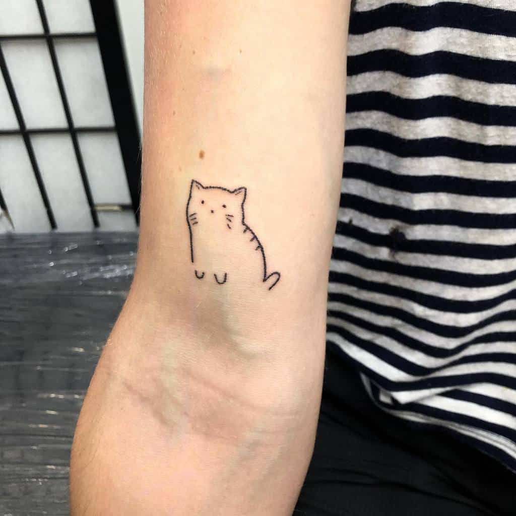 Small Cat Outline Tattoo tendertattzz