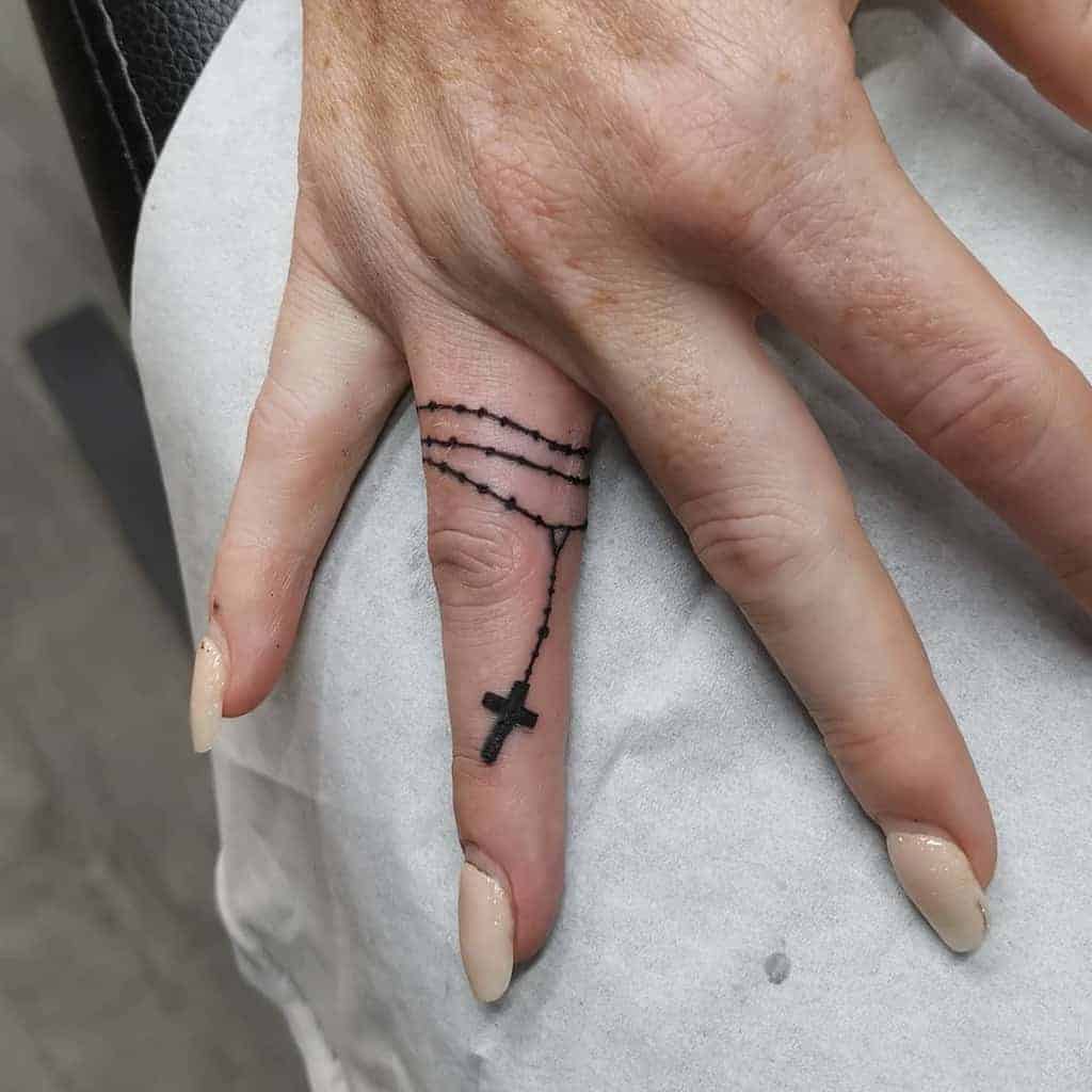 Details 75+ cross tattoo on finger super hot - thtantai2