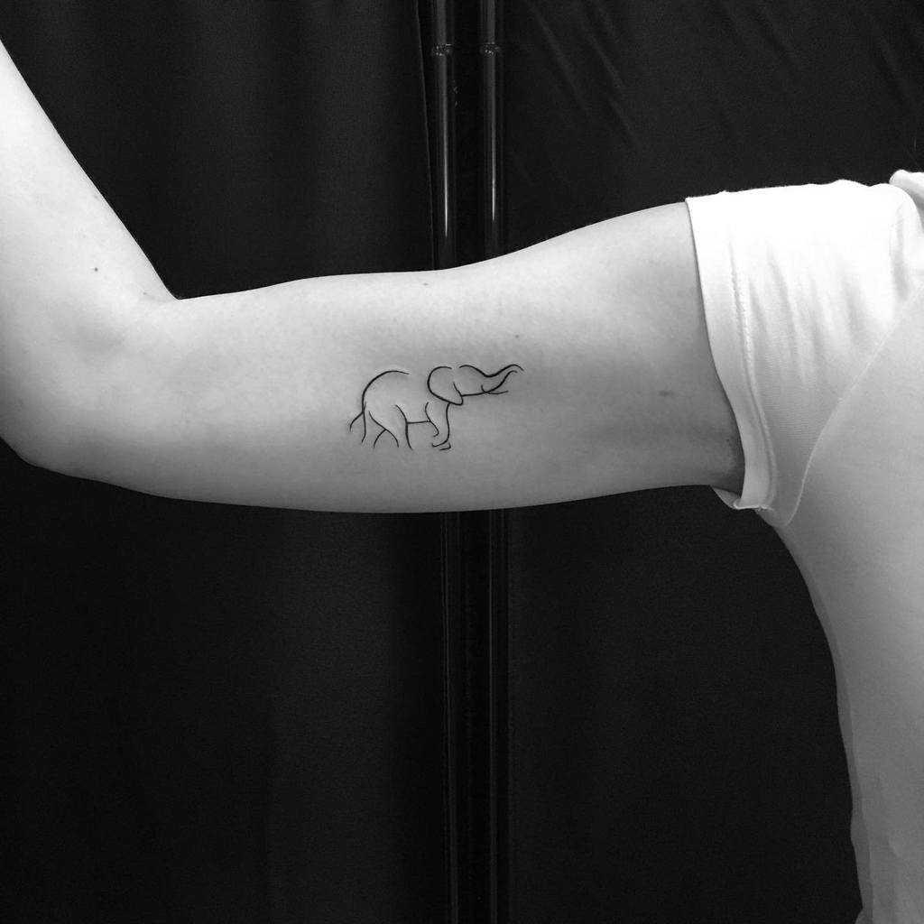 Small Elephant Upperarm Tattoo Gabikatattoo