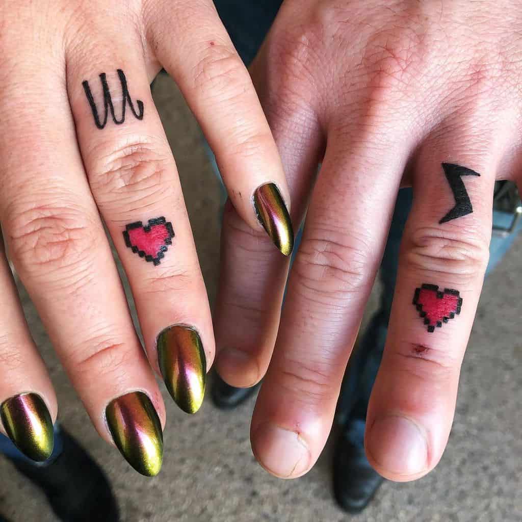 Small Heart Finger Tattoos threeseastattoo