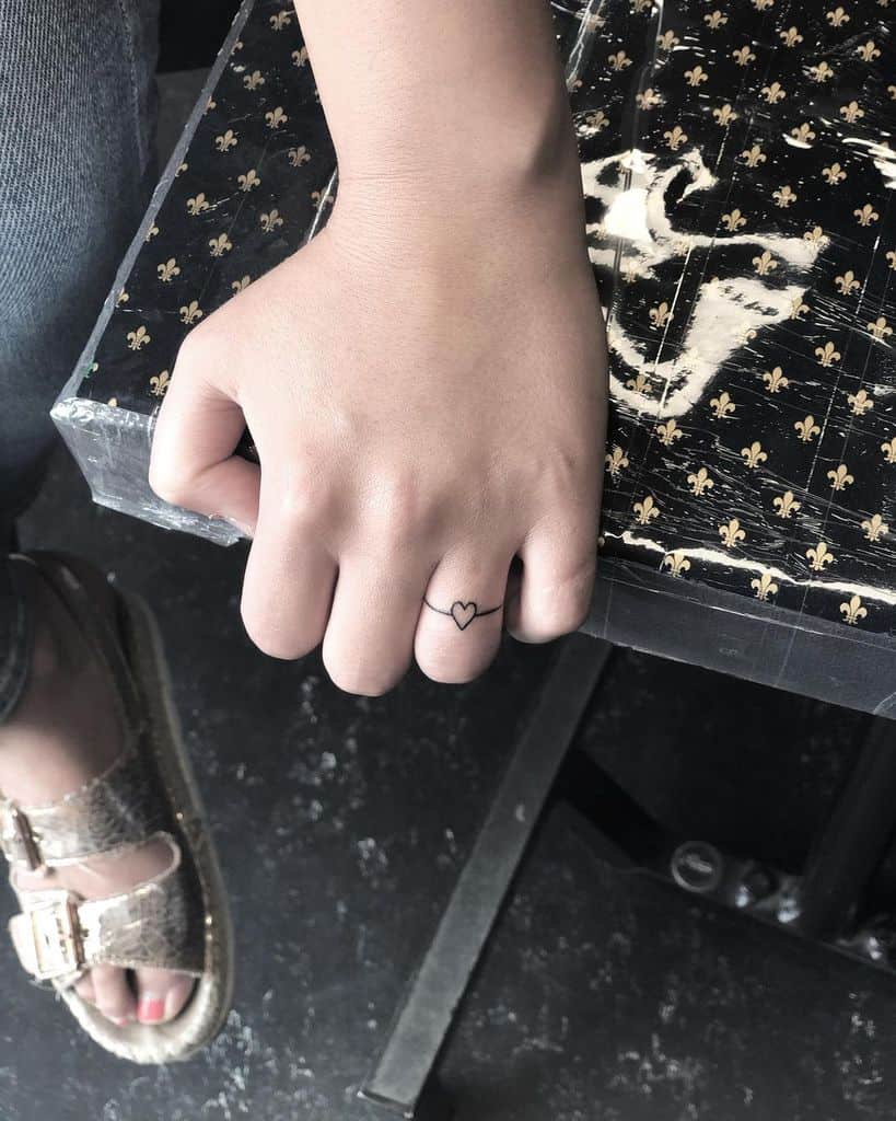 Small Heart Hand Finger Tattoos laura.tinta