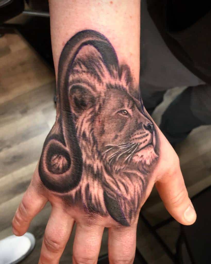 Small Lion Hand Finger Tattoos alecander.michael