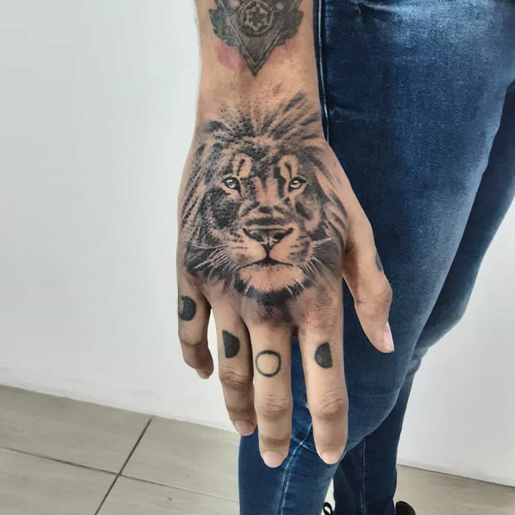 Small Lion Hand Finger Tattoos campostattooink