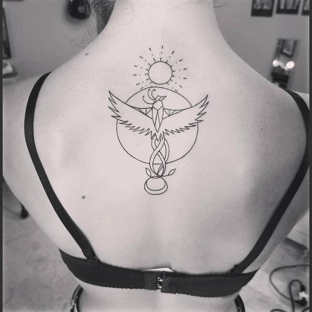 Small Phoenix Back Tattoos leone_vanessa