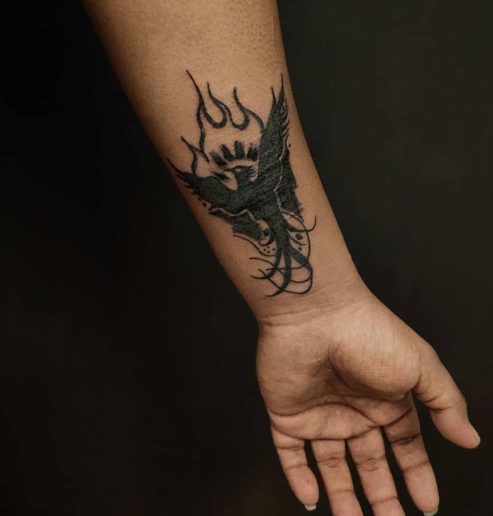 Tattoo tagged with: neotrad, phoenix, wrist | inked-app.com