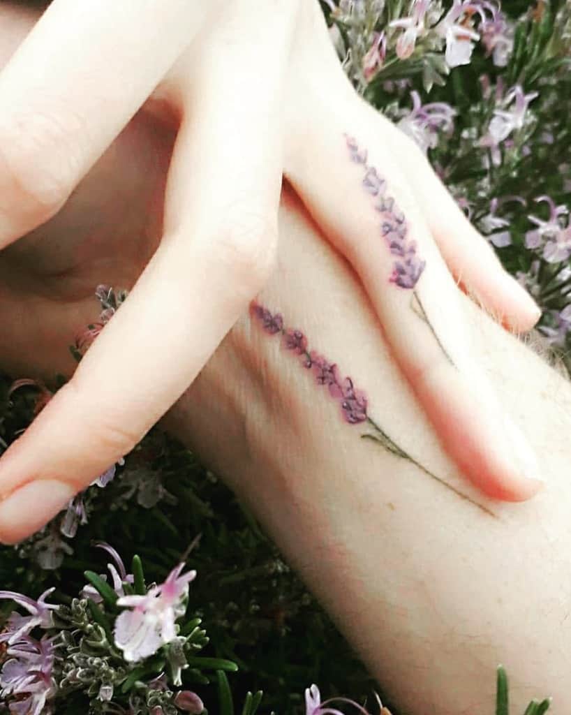 Small Purple Flower Tattoo inky_wood_ribbons
