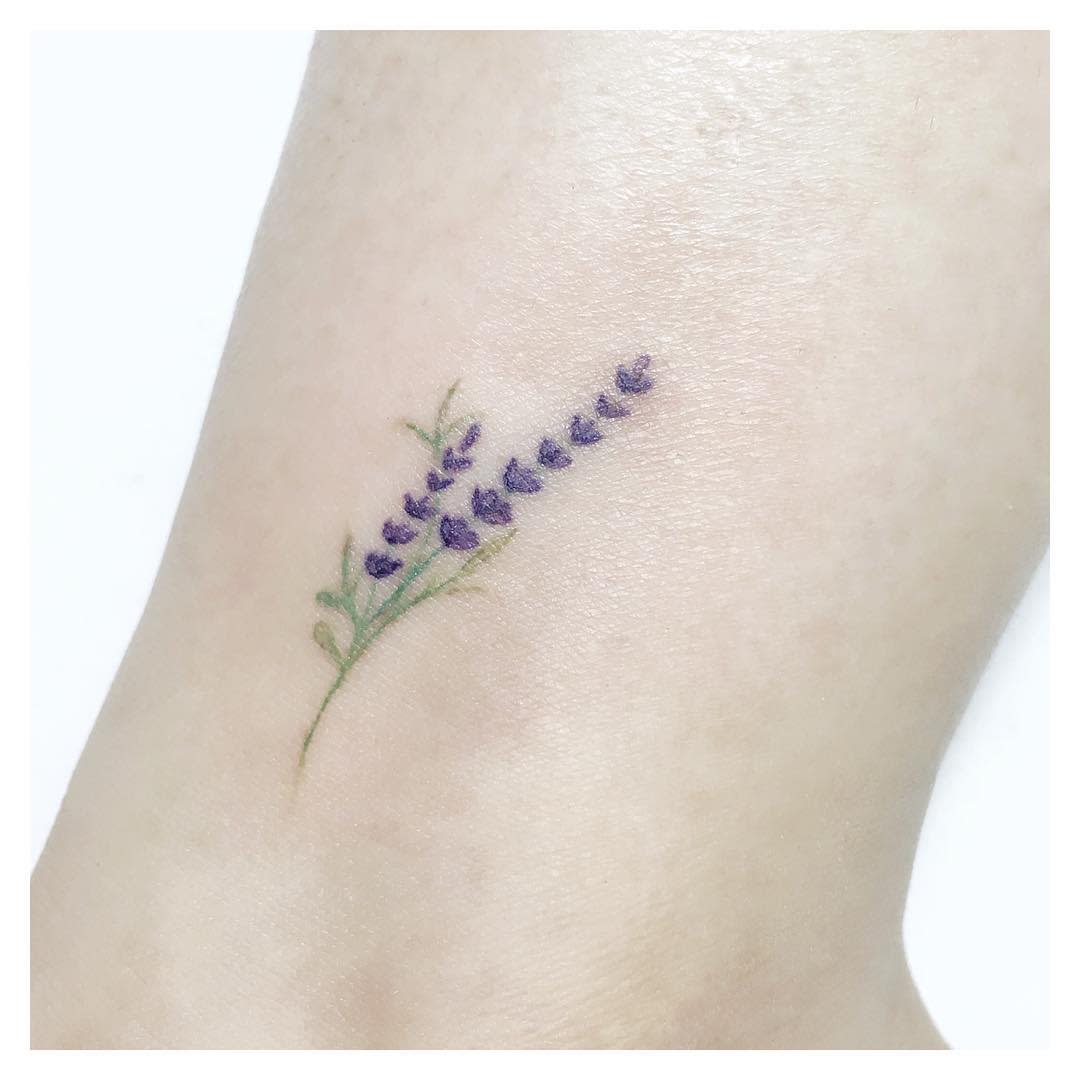 Small Purple Flower Tattoo meimei.tattoostudio