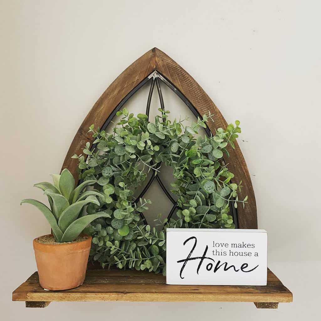 small shelf in home with pot plant 