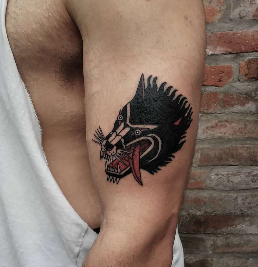 Small Traditional Wolf Tattoo dmh.tattoo
