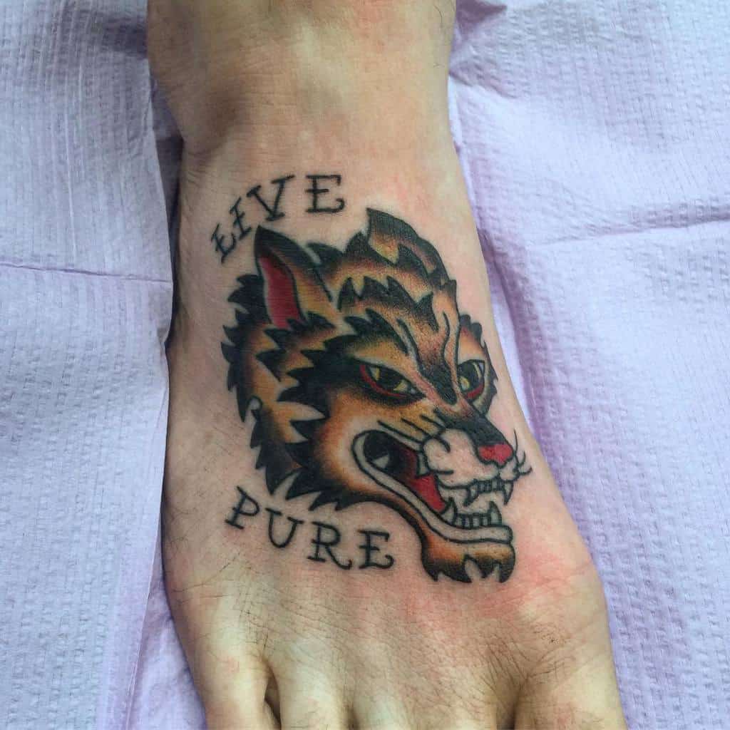 Small Traditional Wolf Tattoo youdevilyou