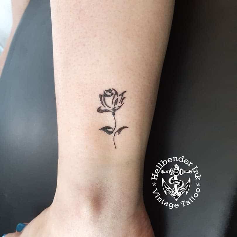 Small Tribal Flower Tattoo dougnewtontattooartist