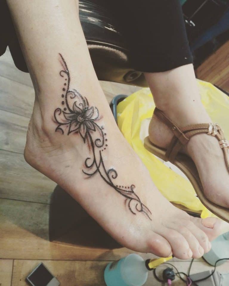 tribal-flower-tattoo-ideas-combining-nature-and-tradition