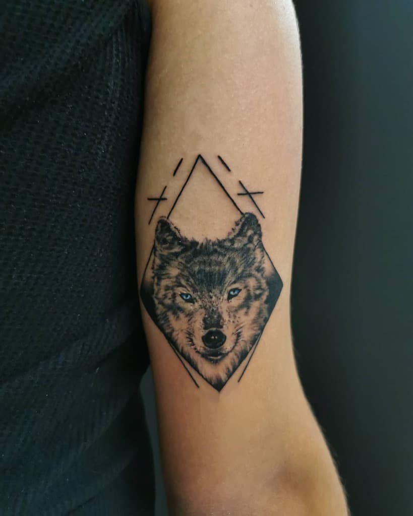 Small Wolf Realistic Tattoo athensfineartstattoo